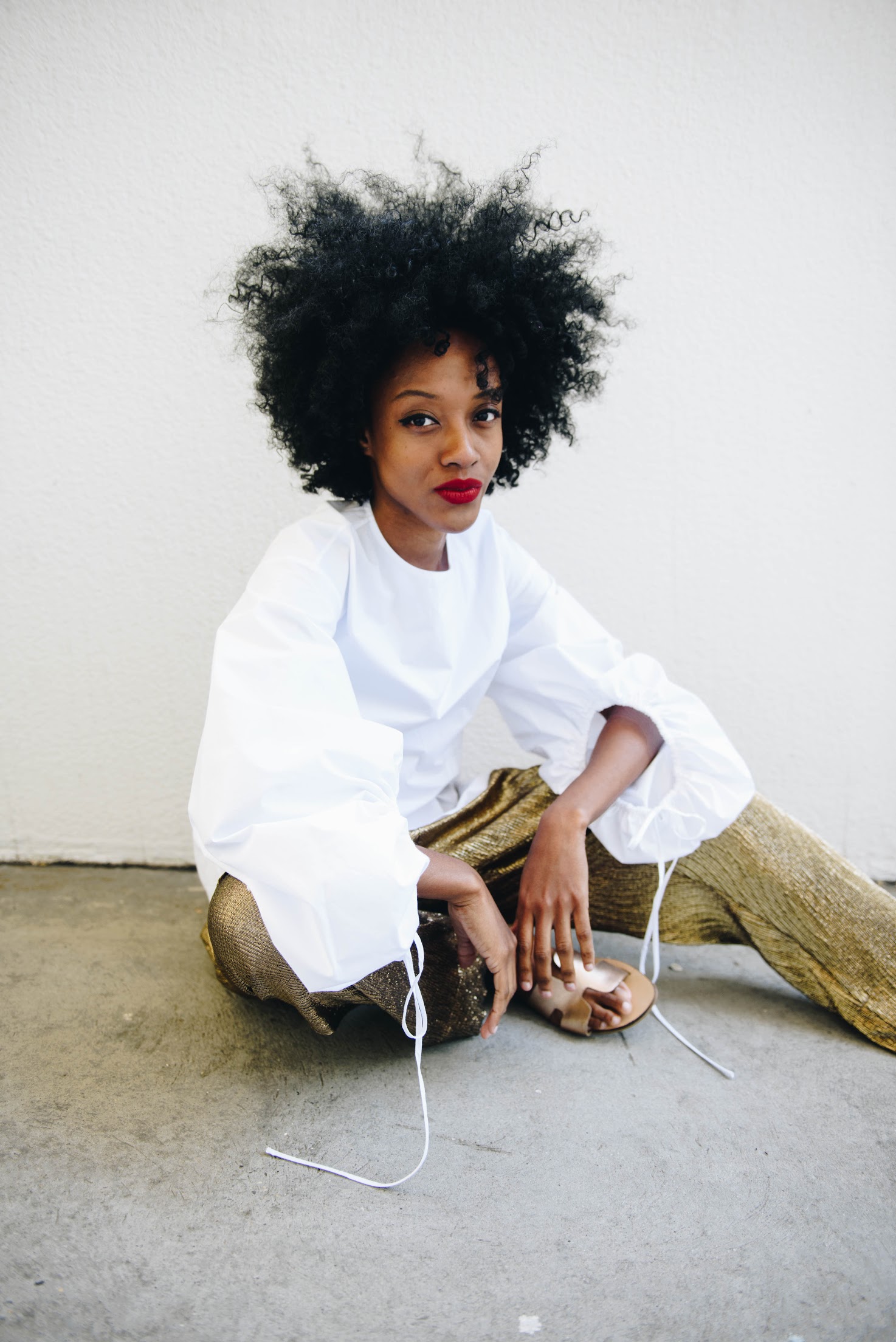 Fashion Blogger Kamara Williams shares two effortlessly chic ways to style a white blouse